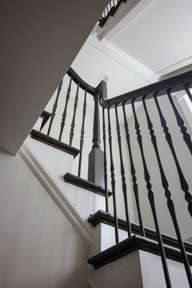 Staircase - large transitional wooden l-shaped mixed material railing staircase idea in DC Metro with painted risers