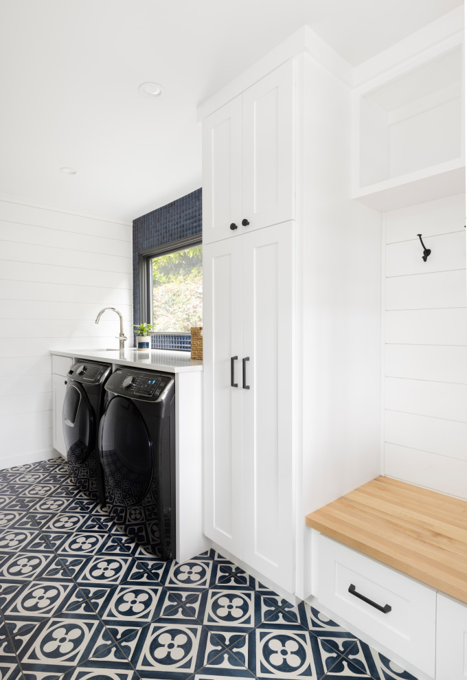 Design ideas for a beach style laundry room in Portland.
