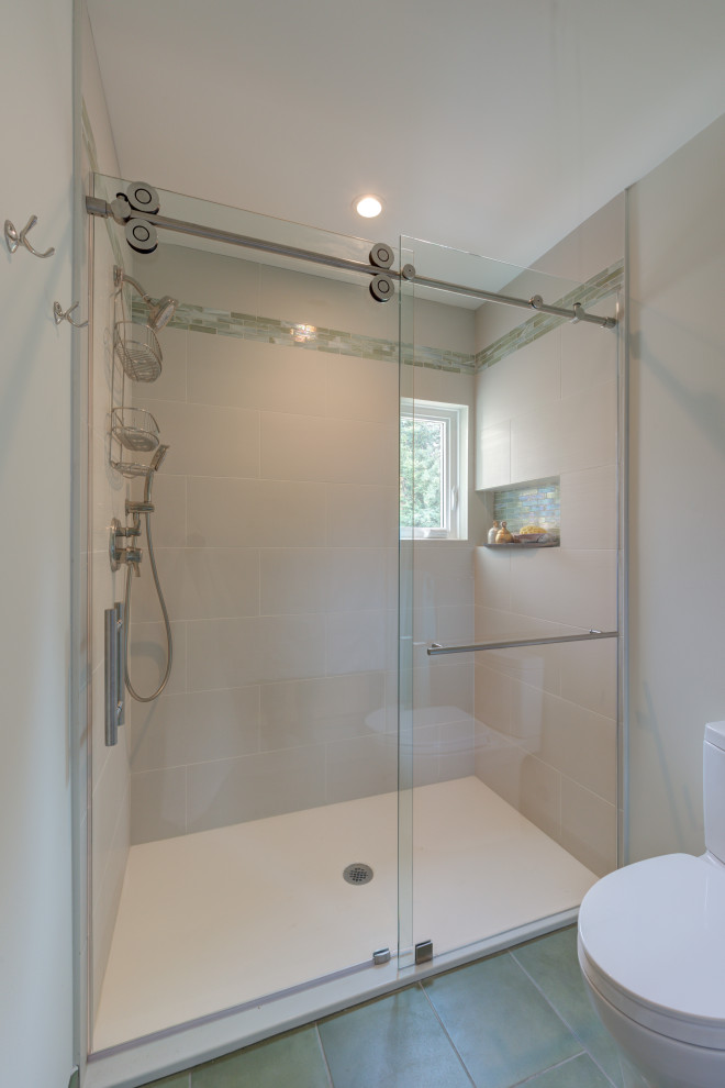 Photo of a small transitional master bathroom in San Francisco with an alcove shower, multi-coloured tile, glass tile, white walls, porcelain floors, green floor and a sliding shower screen.