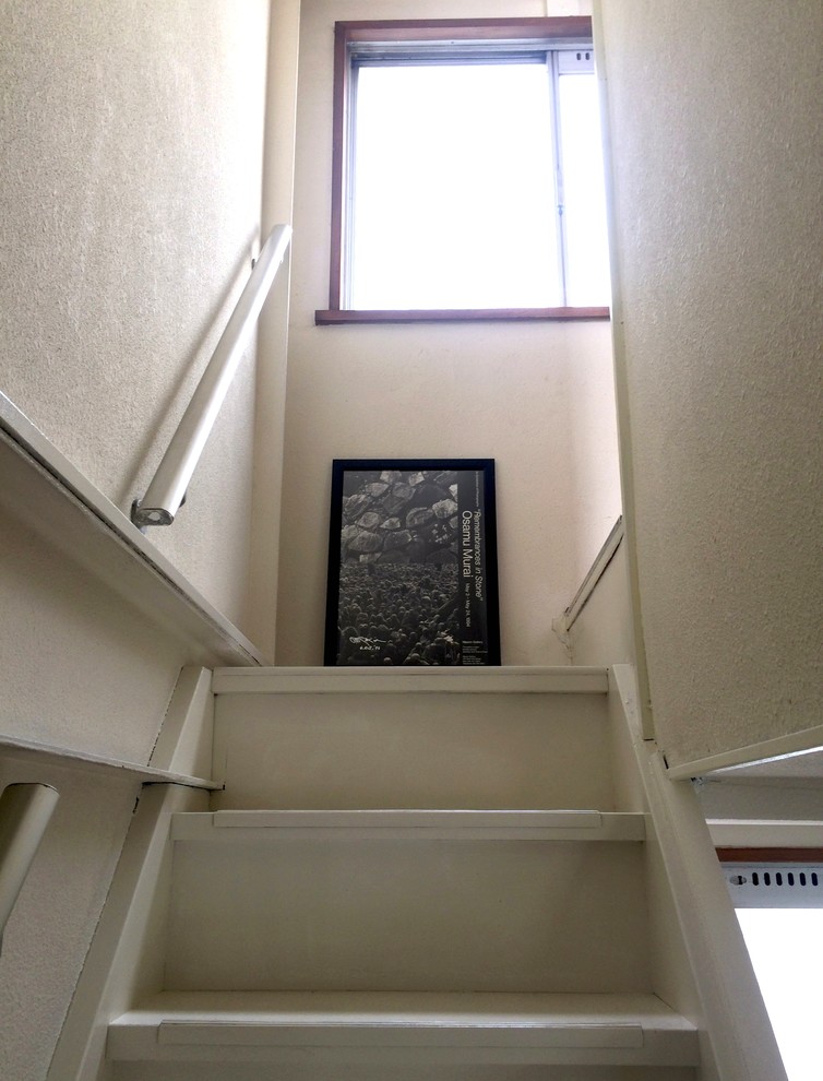 東京23区にあるエクレクティックスタイルのおしゃれな階段の写真