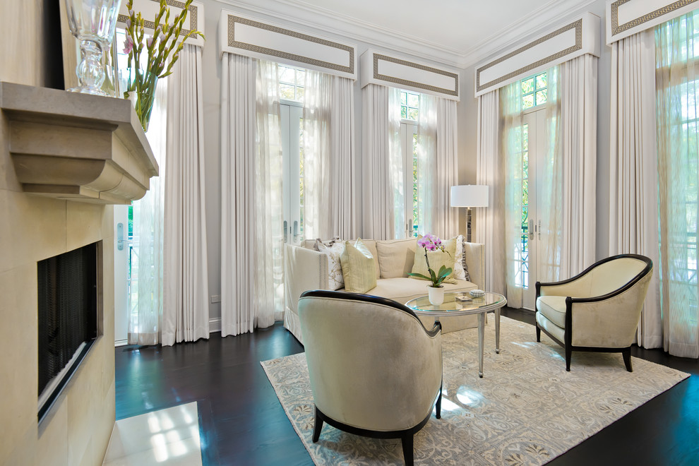 Example of a mid-sized transitional formal and open concept dark wood floor living room design in Chicago with gray walls, no tv and a ribbon fireplace