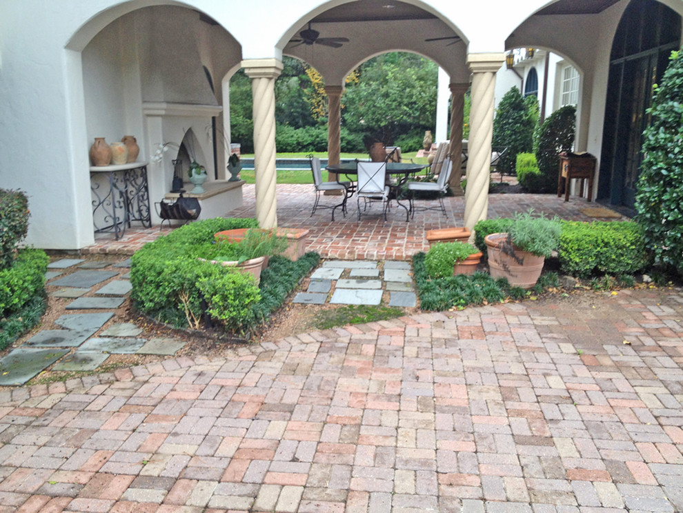 This is an example of a mediterranean patio in Houston.
