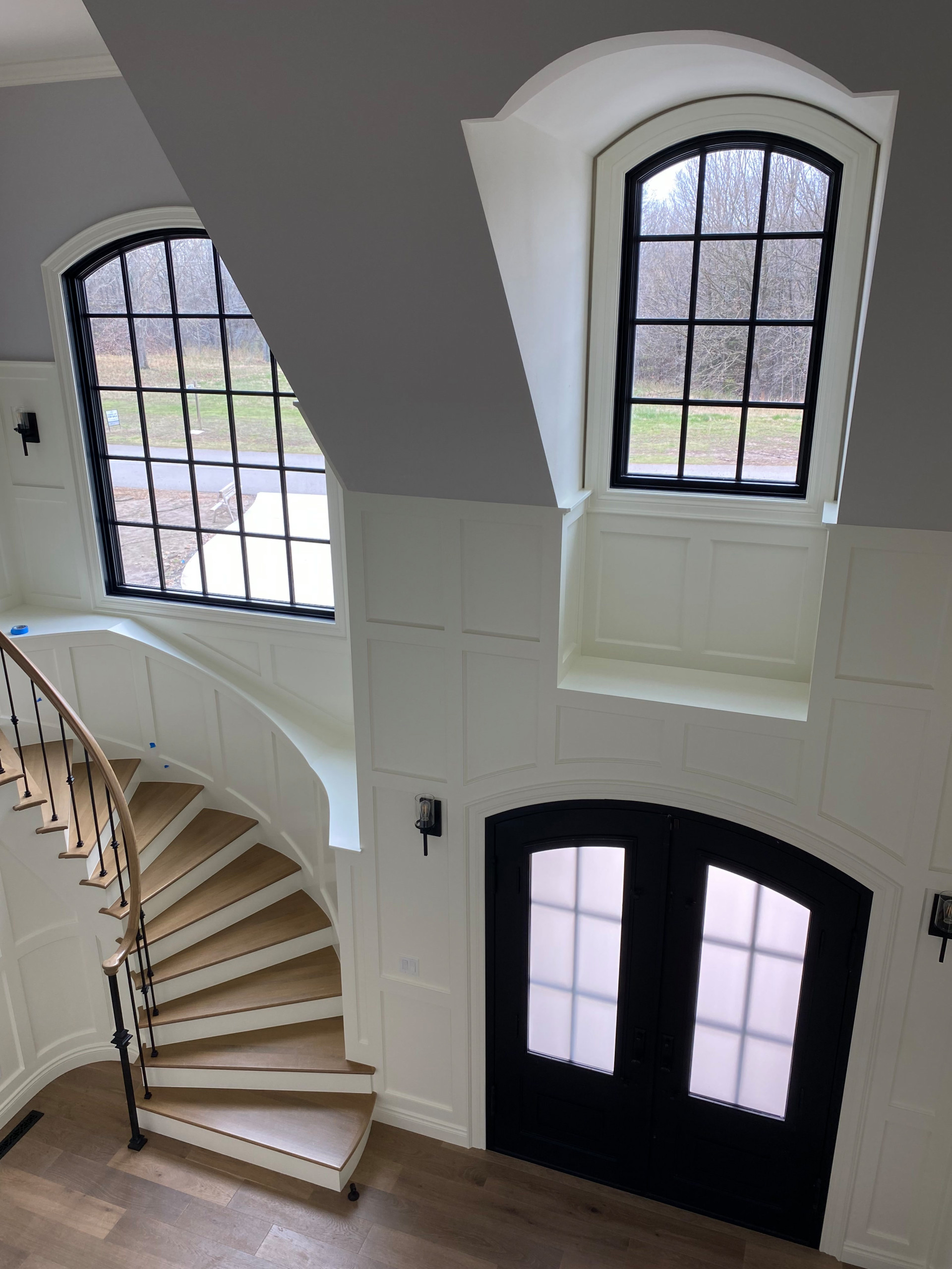 view from balcony to downstairs entryway