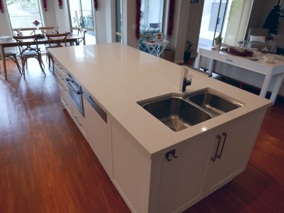 This is an example of a coastal kitchen in Brisbane.
