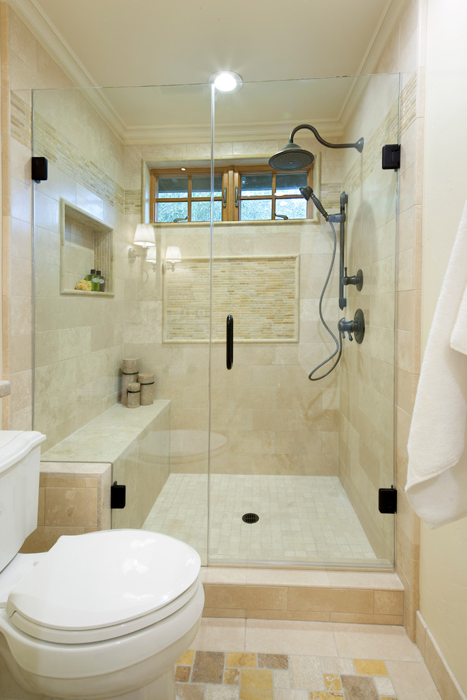 Inspiration for a small country 3/4 bathroom in Sacramento with furniture-like cabinets, yellow cabinets, an alcove shower, multi-coloured tile, stone tile, limestone benchtops, a two-piece toilet, yellow walls, travertine floors and an undermount sink.