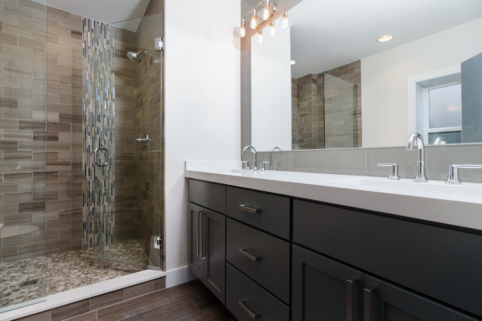 Photo of a mid-sized industrial master bathroom in Denver with an undermount sink, shaker cabinets, dark wood cabinets, quartzite benchtops, an alcove tub, an open shower, a two-piece toilet, white tile, ceramic tile, beige walls and ceramic floors.