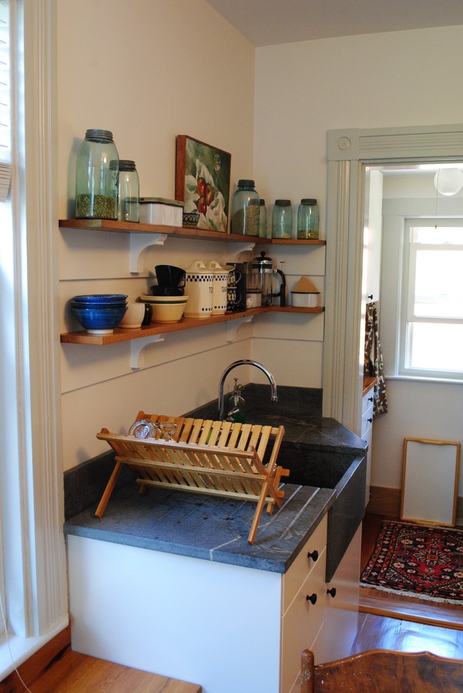 Country kitchen in Boston with a farmhouse sink.