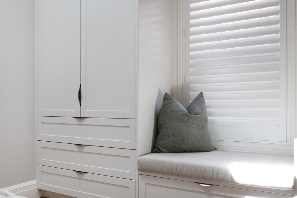 This is an example of a contemporary storage and wardrobe in Sydney.