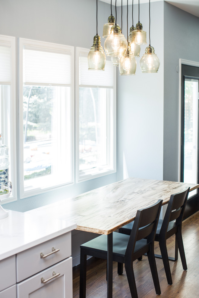 Huge transitional u-shaped eat-in kitchen photo in Denver with shaker cabinets, gray cabinets, quartz countertops, blue backsplash, no island and white countertops