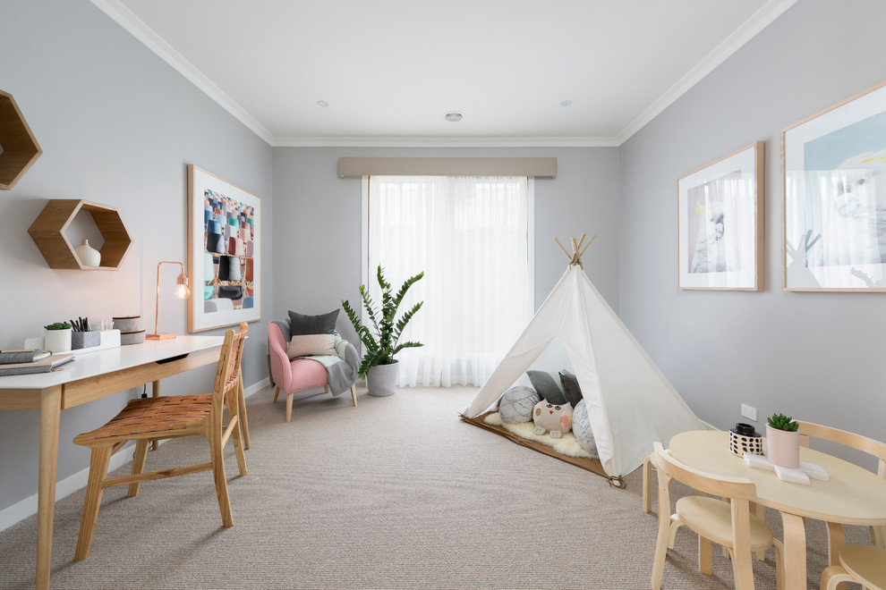 Scandinavian kids' playroom in Melbourne with grey walls and carpet for girls.