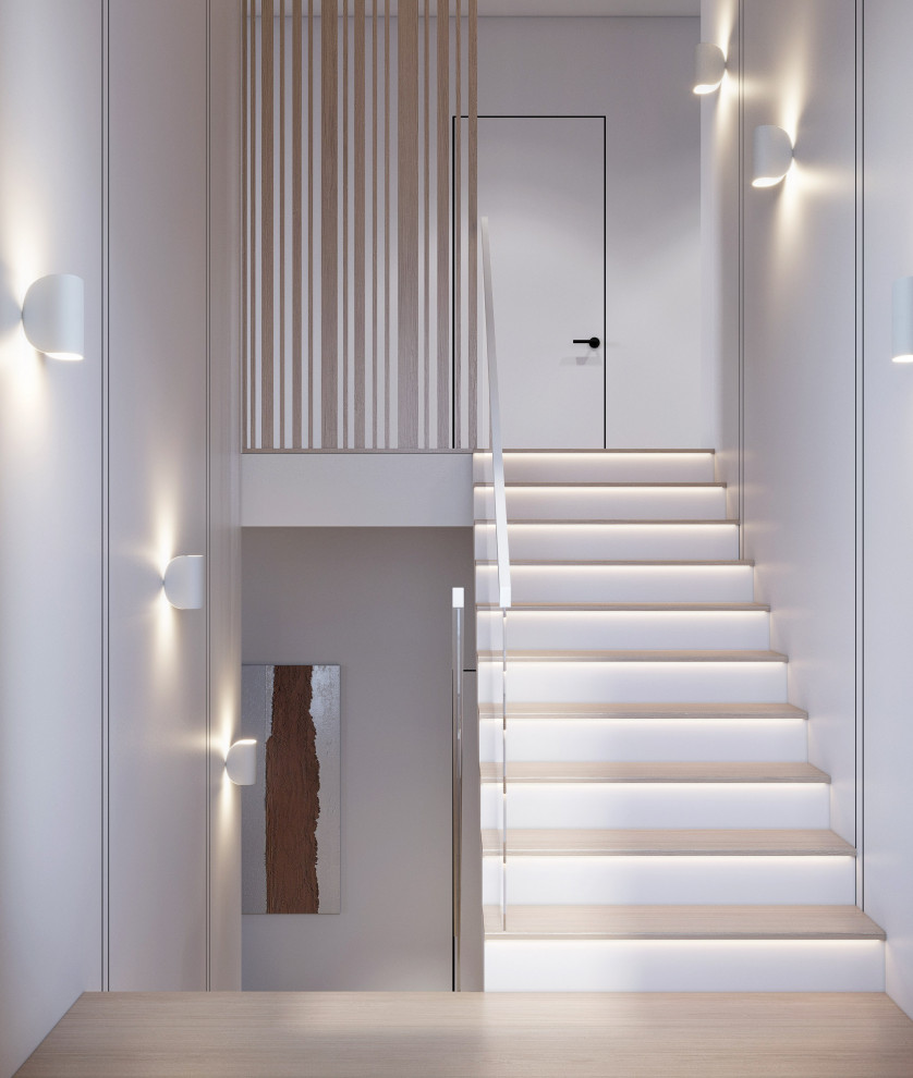 Идея дизайна: прямая деревянная лестница среднего размера в современном стиле с бетонными ступенями, стеклянными перилами и панелями на стенах