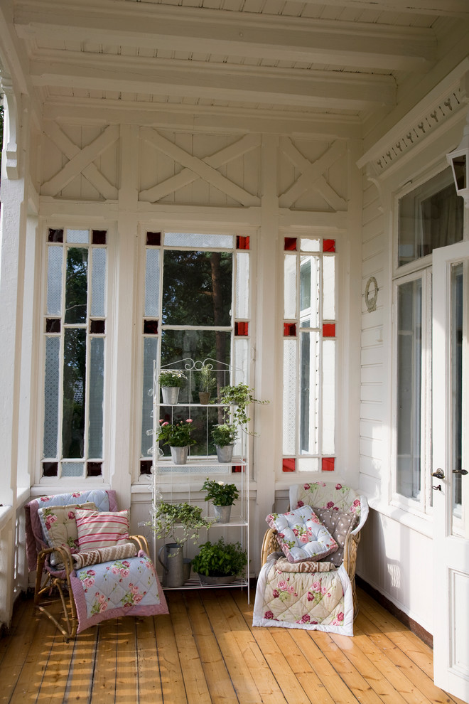 Design ideas for a traditional verandah in Other with decking and a roof extension.