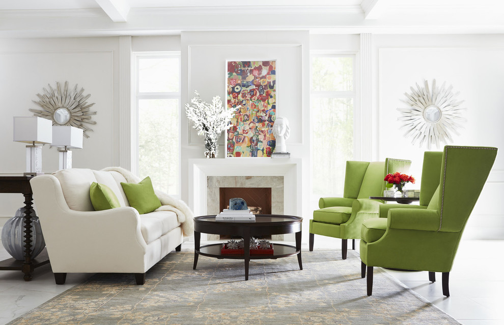 Design ideas for a transitional living room in Los Angeles with white walls, a standard fireplace and white floor.