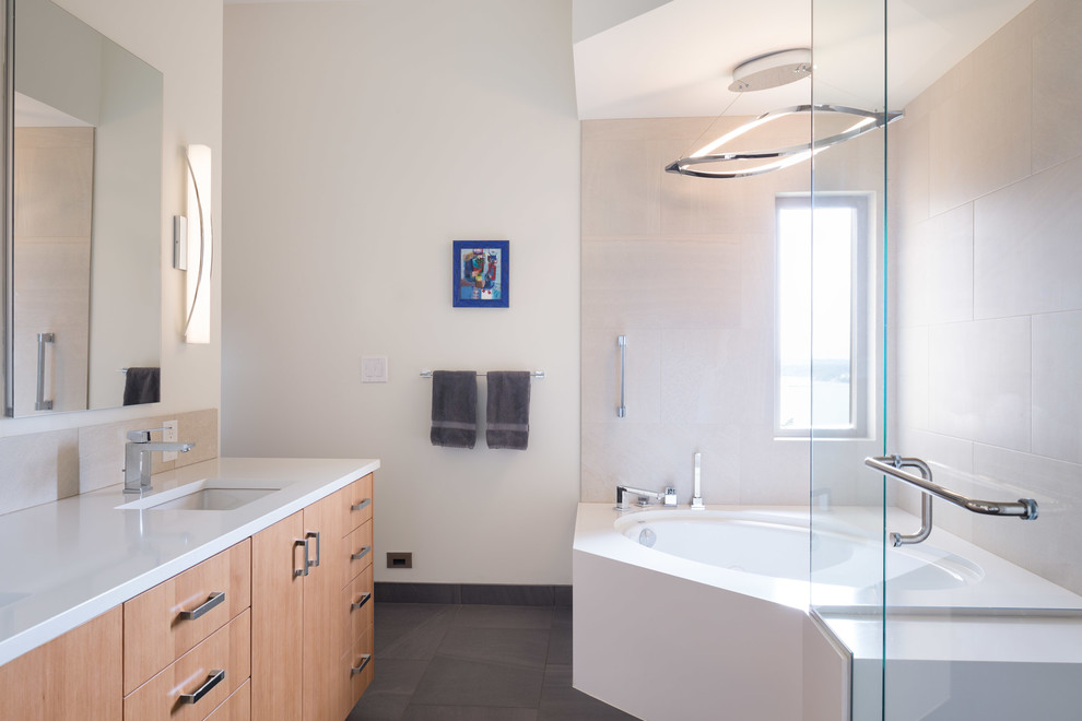 Design ideas for a modern master bathroom in Seattle with flat-panel cabinets, a corner tub, a curbless shower, white walls, ceramic floors, an undermount sink, engineered quartz benchtops, grey floor and a hinged shower door.