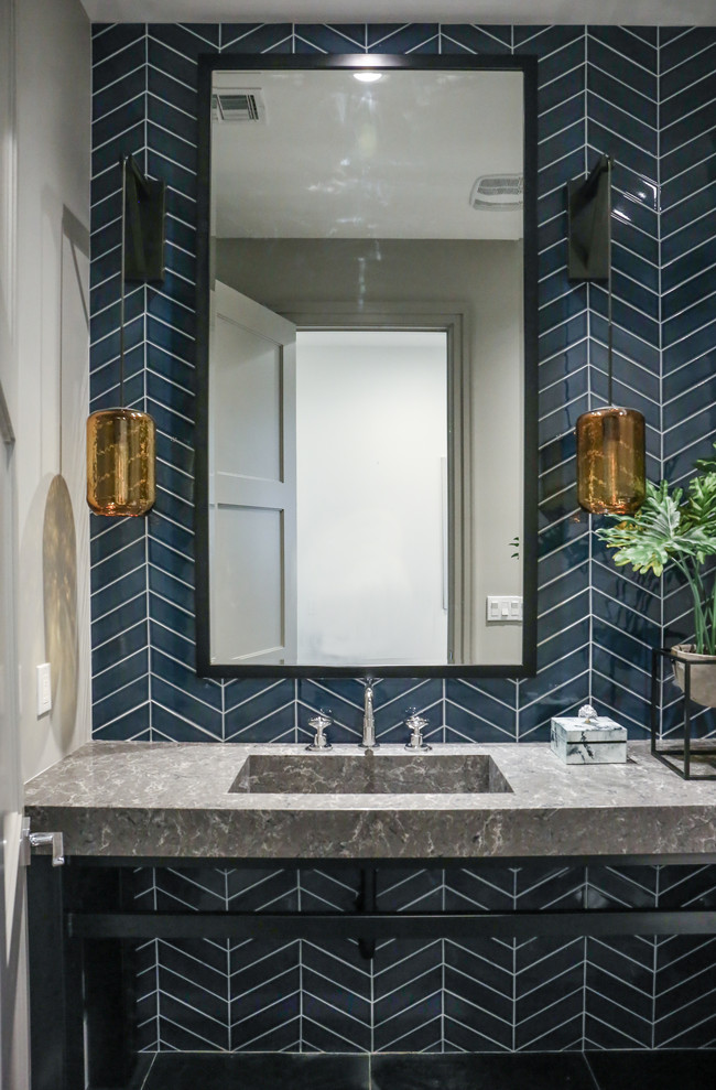 Mid-sized country master bathroom in Phoenix with furniture-like cabinets, black cabinets, a one-piece toilet, multi-coloured tile, porcelain tile, concrete floors, a vessel sink, concrete benchtops, brown floor and black benchtops.