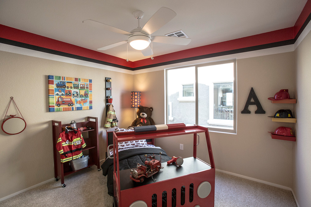 Design ideas for a traditional kids' bedroom for kids 4-10 years old and boys in Las Vegas with beige walls and carpet.