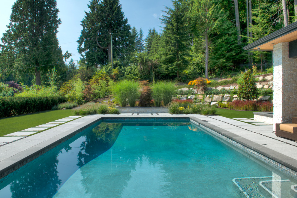 This is an example of a contemporary rectangular pool in Vancouver.
