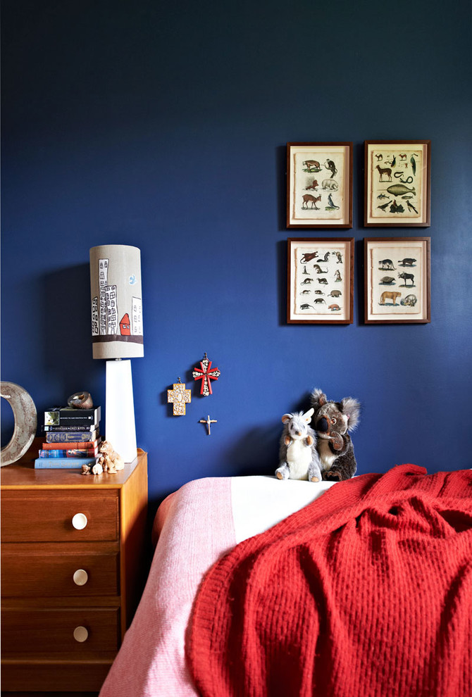 Design ideas for an eclectic bedroom in Melbourne with blue walls.