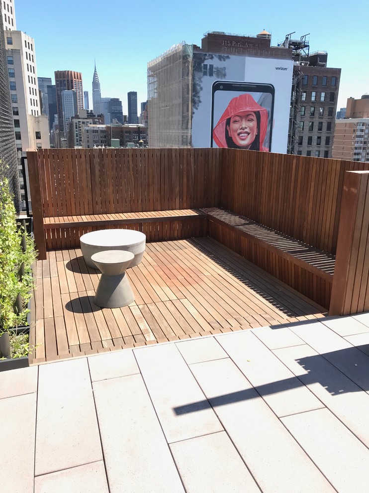 Inspiration for a mid-sized modern rooftop deck in New York with no cover.
