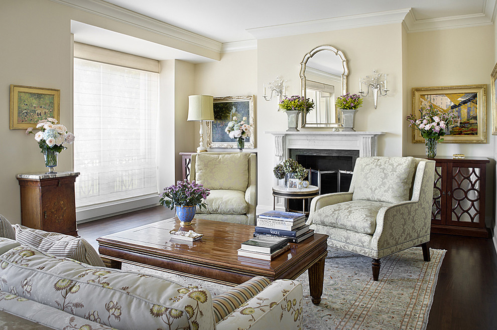 This is an example of a traditional enclosed living room in Chicago with beige walls.