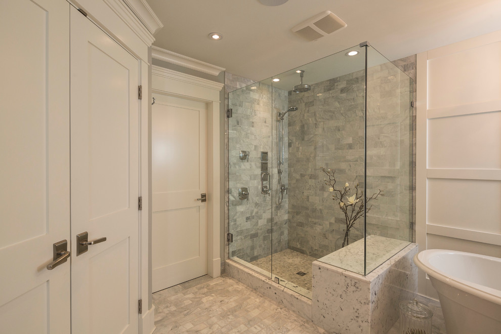 Inspiration for a mid-sized traditional master bathroom in Vancouver with an undermount sink, a freestanding tub, a corner shower, gray tile, porcelain tile, white walls and porcelain floors.
