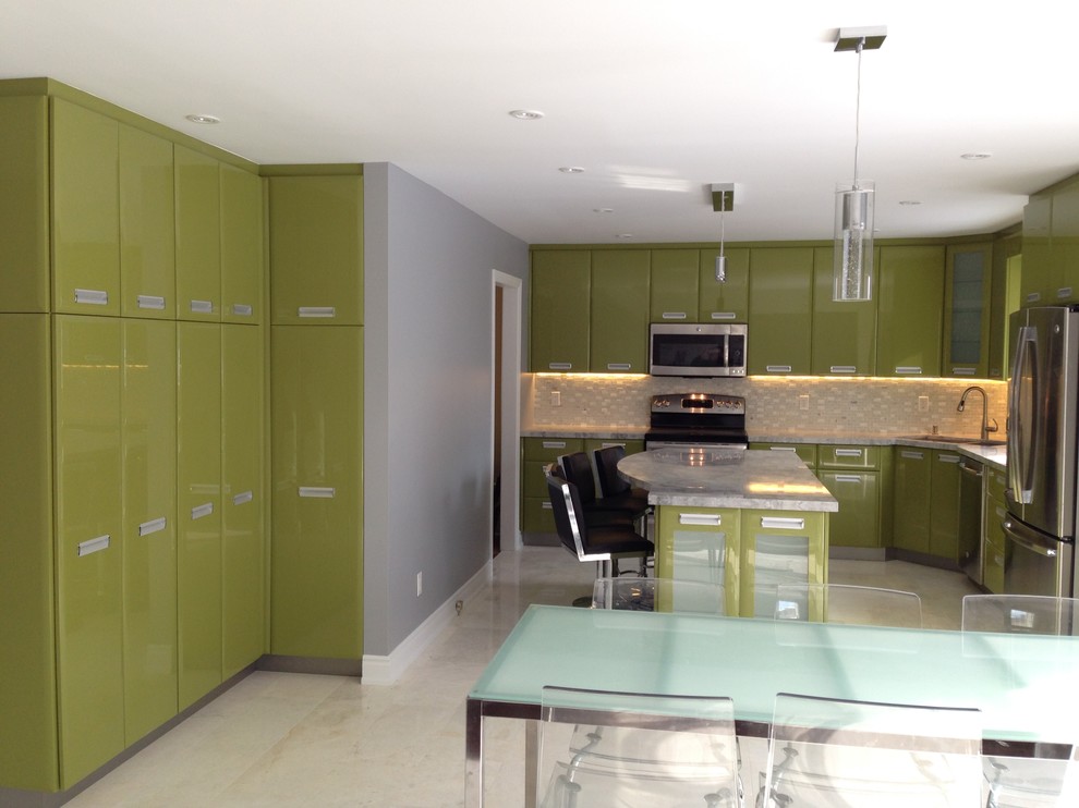 Large contemporary l-shaped eat-in kitchen in Toronto with an undermount sink, flat-panel cabinets, green cabinets, quartzite benchtops, white splashback, mosaic tile splashback, stainless steel appliances, marble floors and with island.