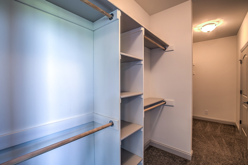 Example of a transitional home design design in Omaha