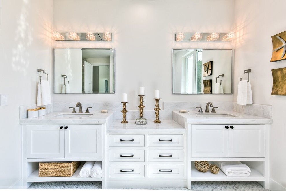 Freestanding bathtub - mid-sized transitional 3/4 gray tile and marble tile mosaic tile floor and gray floor freestanding bathtub idea in Orange County with shaker cabinets, white cabinets, gray walls, an undermount sink, marble countertops and a hinged shower door