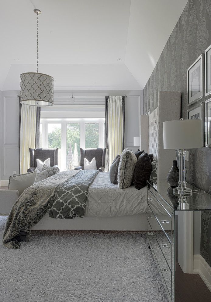 Design ideas for a mid-sized transitional master bedroom in Toronto with grey walls, carpet, a ribbon fireplace and white floor.