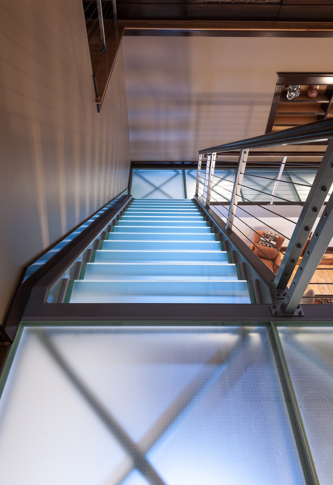 Mid-sized contemporary glass straight staircase in Cleveland with open risers.