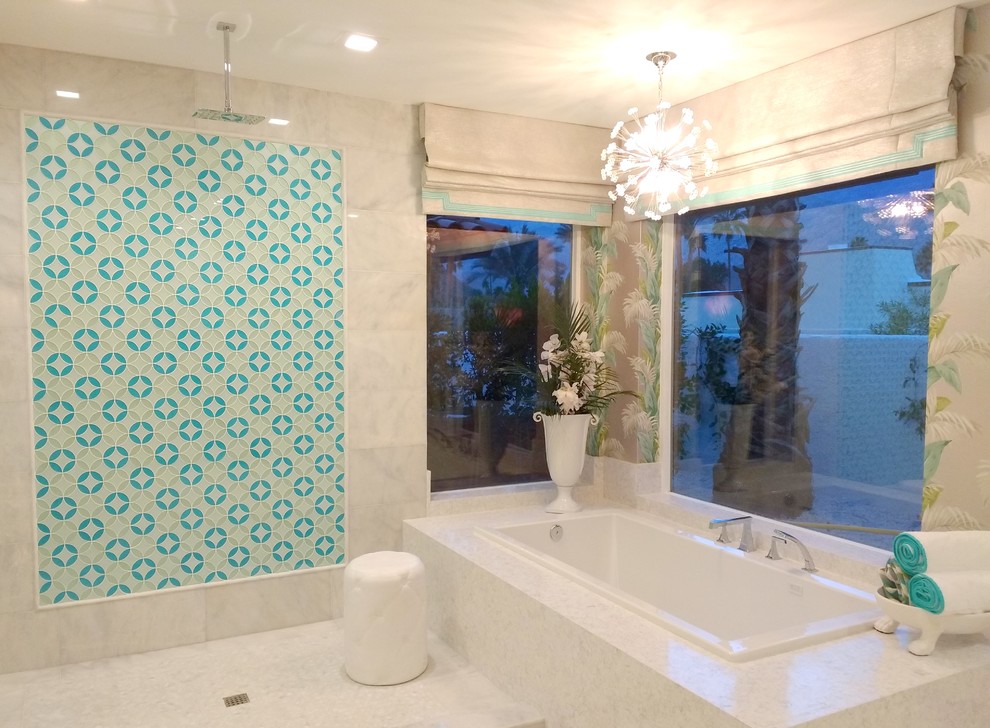 Inspiration for a mid-sized midcentury master bathroom in San Francisco with a drop-in tub, an open shower, glass tile and marble floors.