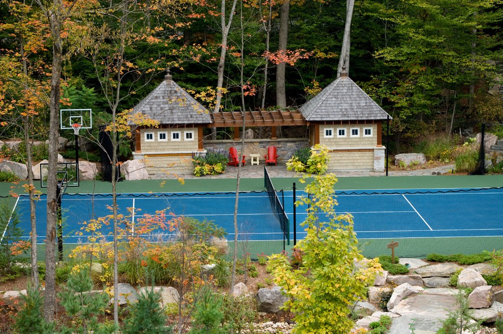 Inspiration for a country outdoor sport court in Toronto with natural stone pavers.