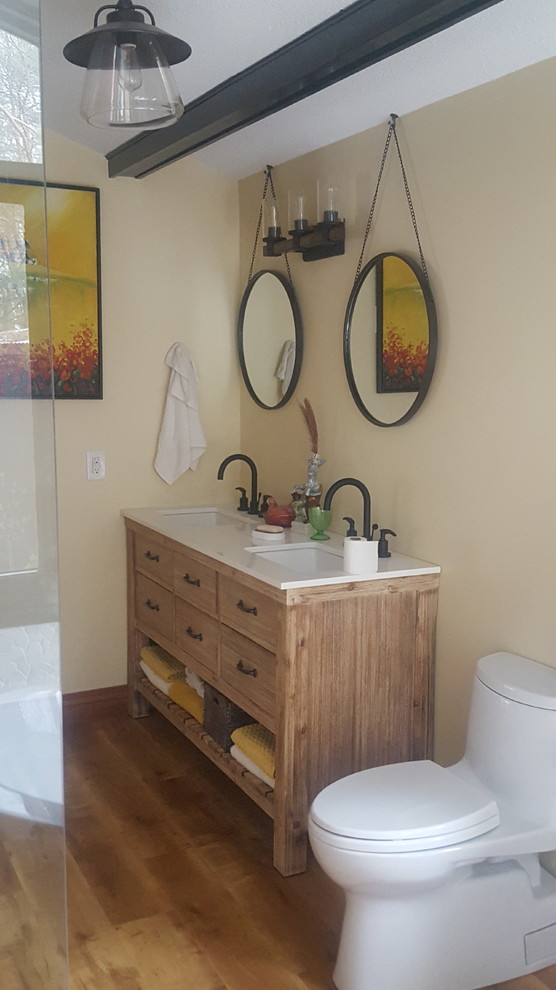 Bathroom - mid-sized rustic master porcelain tile bathroom idea in Toronto with flat-panel cabinets, light wood cabinets and quartzite countertops