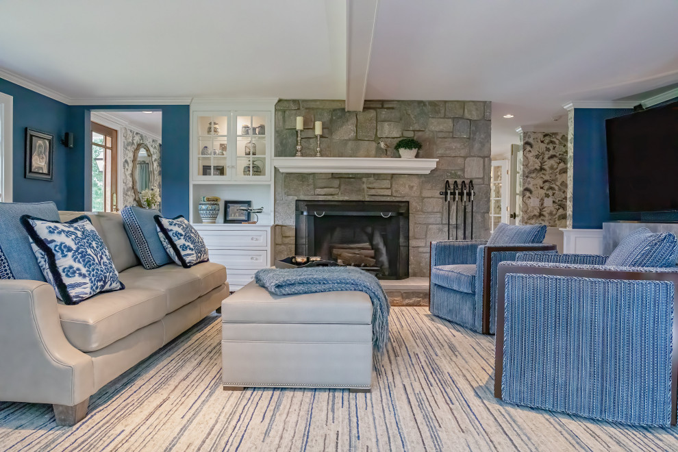 Inspiration for a mid-sized beach style formal open concept living room in Bridgeport with blue walls, carpet, a standard fireplace, a stone fireplace surround, a built-in media wall, blue floor and exposed beam.
