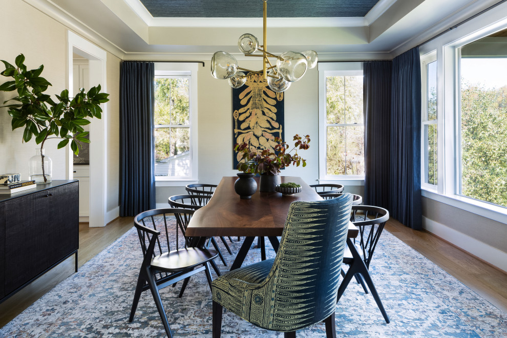 Inspiration for a large eclectic light wood floor, beige floor, wallpaper ceiling and wallpaper enclosed dining room remodel in DC Metro with beige walls