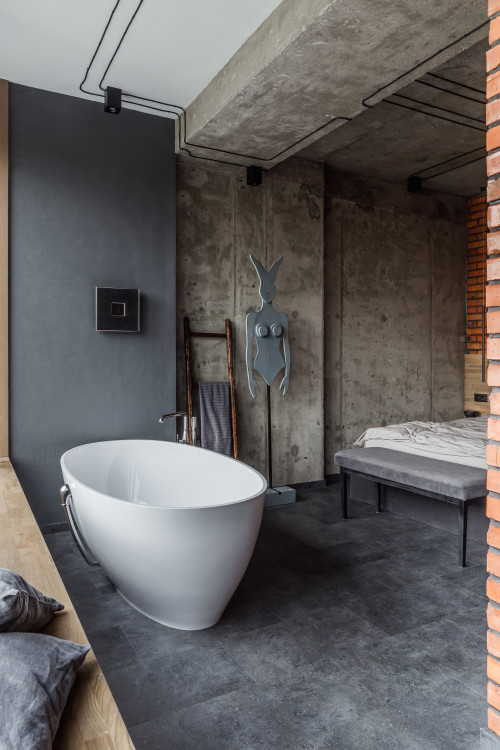 Raw and Rugged: Industrial Bathroom with Concrete and Brick Walls