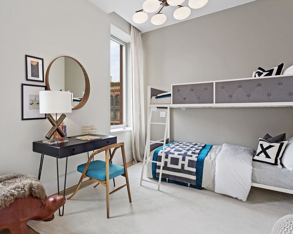 Inspiration for a contemporary gender-neutral kids' bedroom in New York with beige walls, light hardwood floors and beige floor.