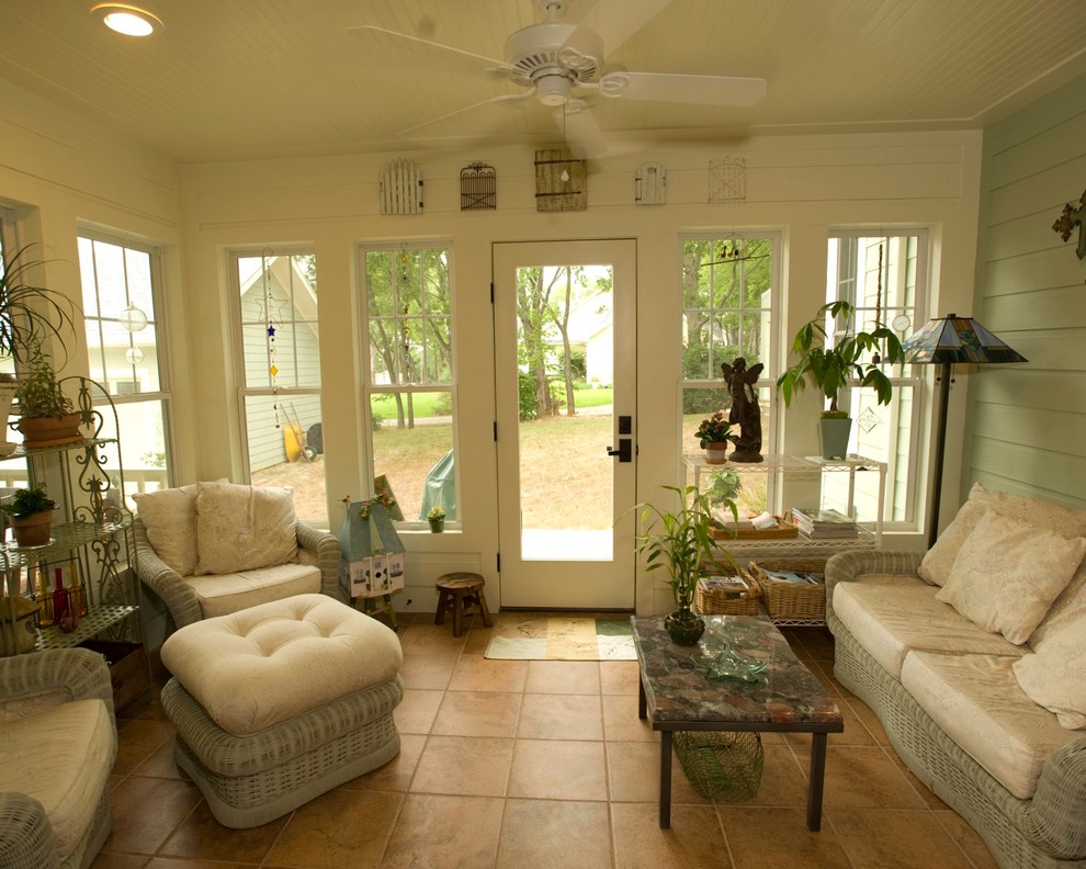 Small arts and crafts sunroom in Dallas with porcelain floors, no fireplace, a standard ceiling and orange floor.