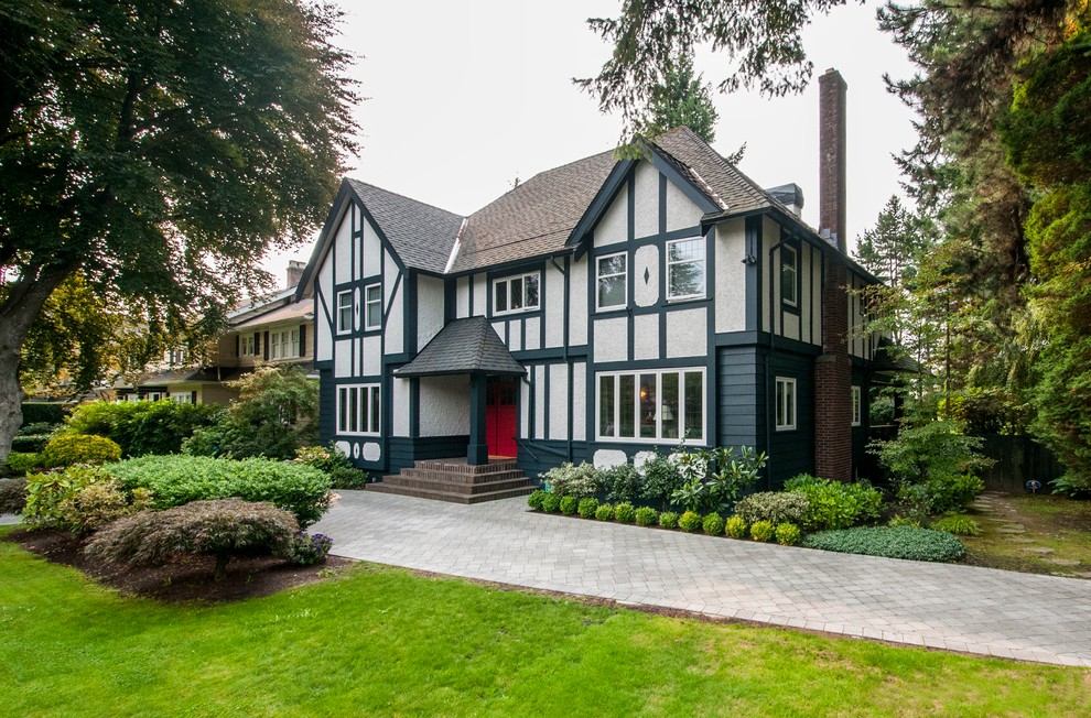Traditional stucco blue exterior in Vancouver.