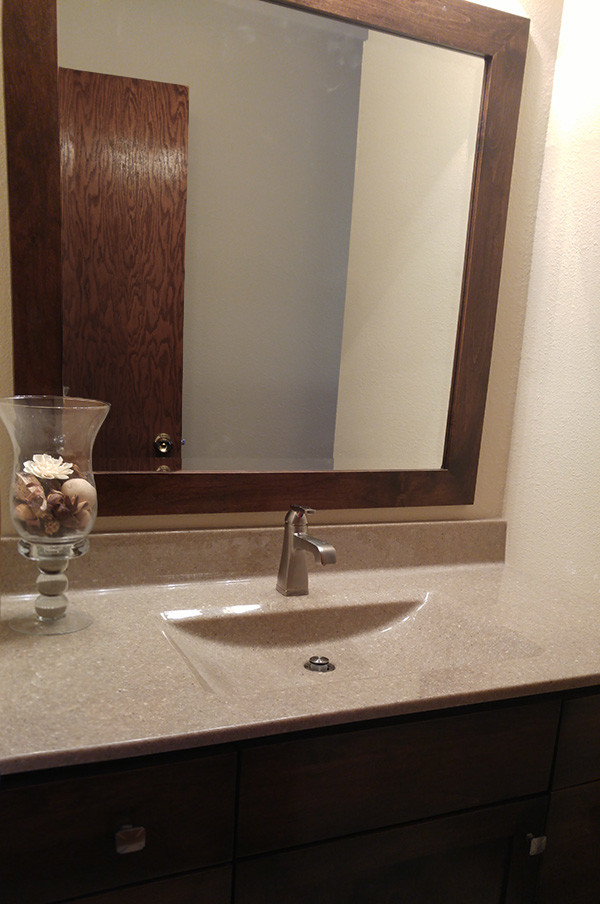 Example of a mid-sized transitional 3/4 beige tile and ceramic tile ceramic tile alcove bathtub design with shaker cabinets, dark wood cabinets, a two-piece toilet, white walls, an integrated sink and quartz countertops