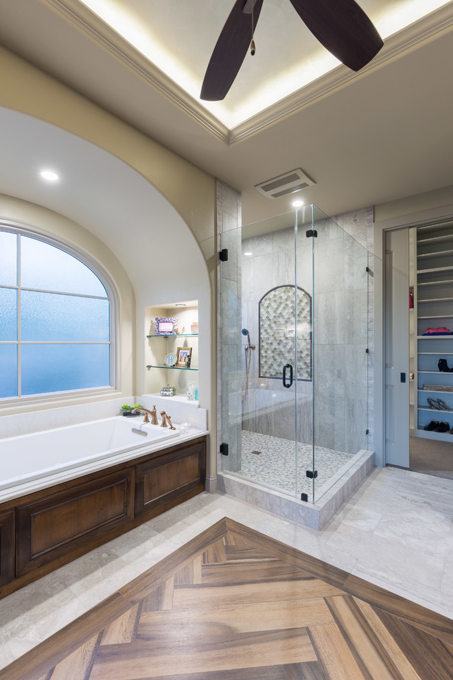 Inspiration for a large transitional master white tile and porcelain tile porcelain tile drop-in bathtub remodel in Austin with medium tone wood cabinets, beige walls, an undermount sink, quartz countertops and recessed-panel cabinets