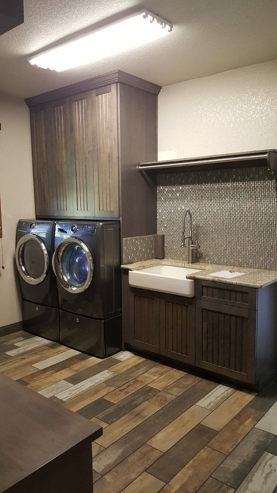 Photo of an arts and crafts laundry room in Denver.