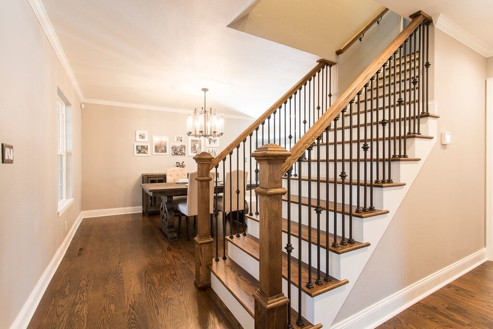 Inspiration for a large transitional foyer in Denver with grey walls and dark hardwood floors.