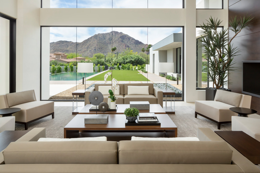Inspiration for a huge modern open concept travertine floor and white floor living room remodel in Phoenix with white walls, a two-sided fireplace and a metal fireplace