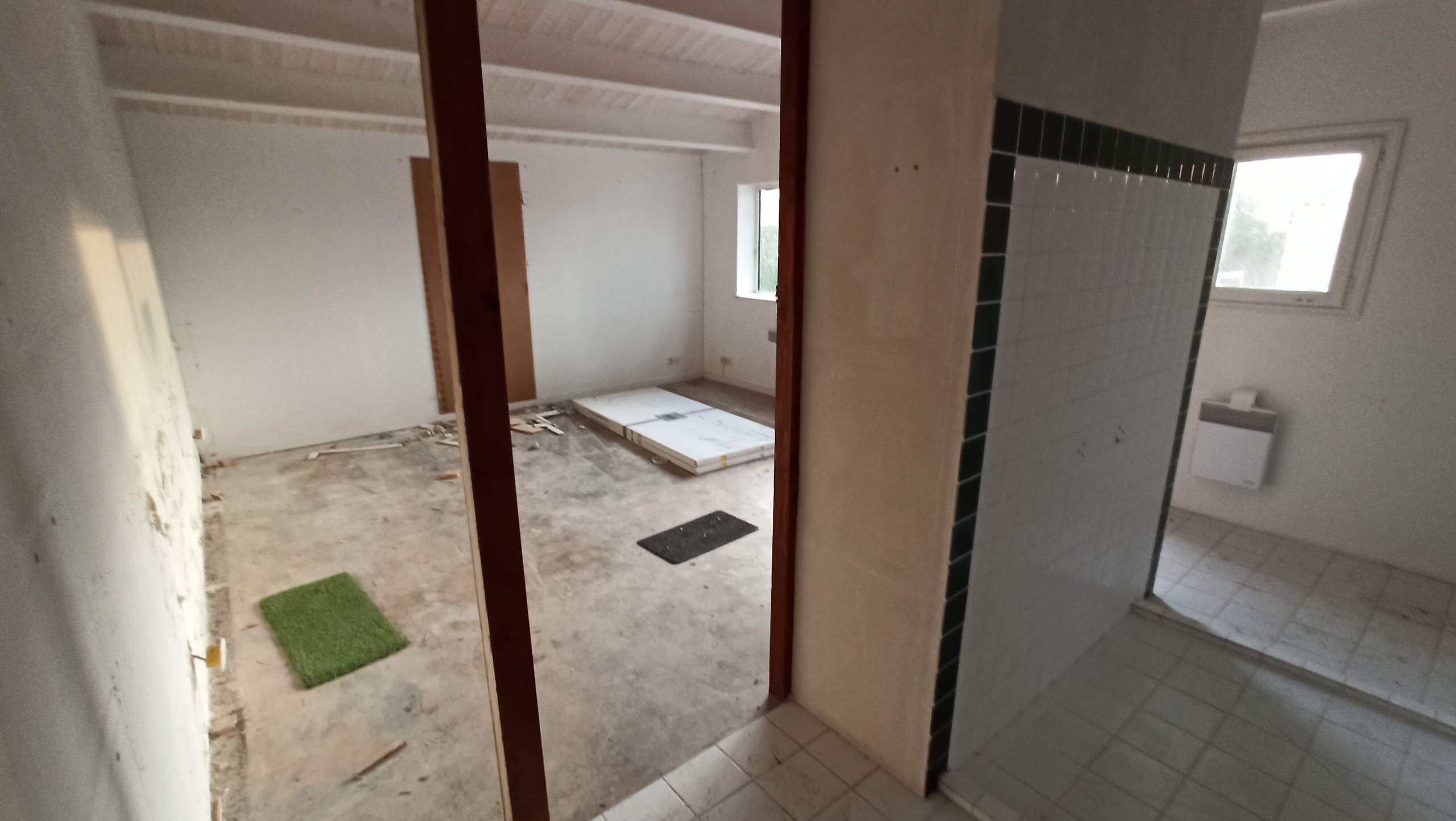 Transformation d'une chambre parentale en pièce de vie/cuisine