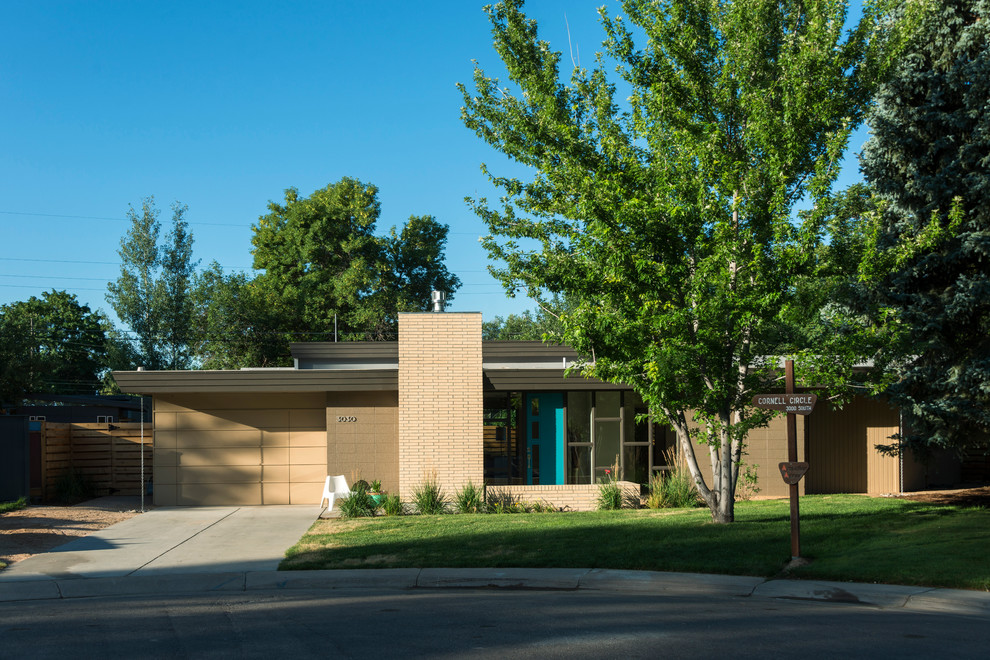 This is an example of a midcentury exterior in Denver.