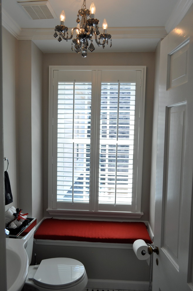 Example of a mid-sized transitional 3/4 ceramic tile bathroom design with a two-piece toilet, beige walls and a pedestal sink