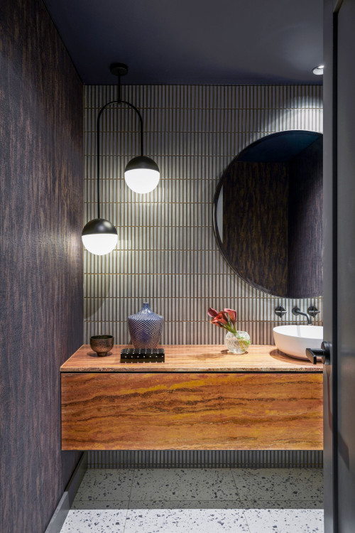 Characteristic Elegance: Gray Kit Kat Tile Bathroom with Black Countertops