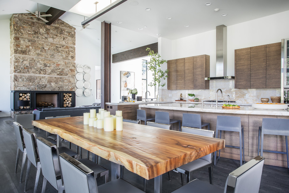 Contemporary open plan dining in Salt Lake City with white walls and dark hardwood floors.