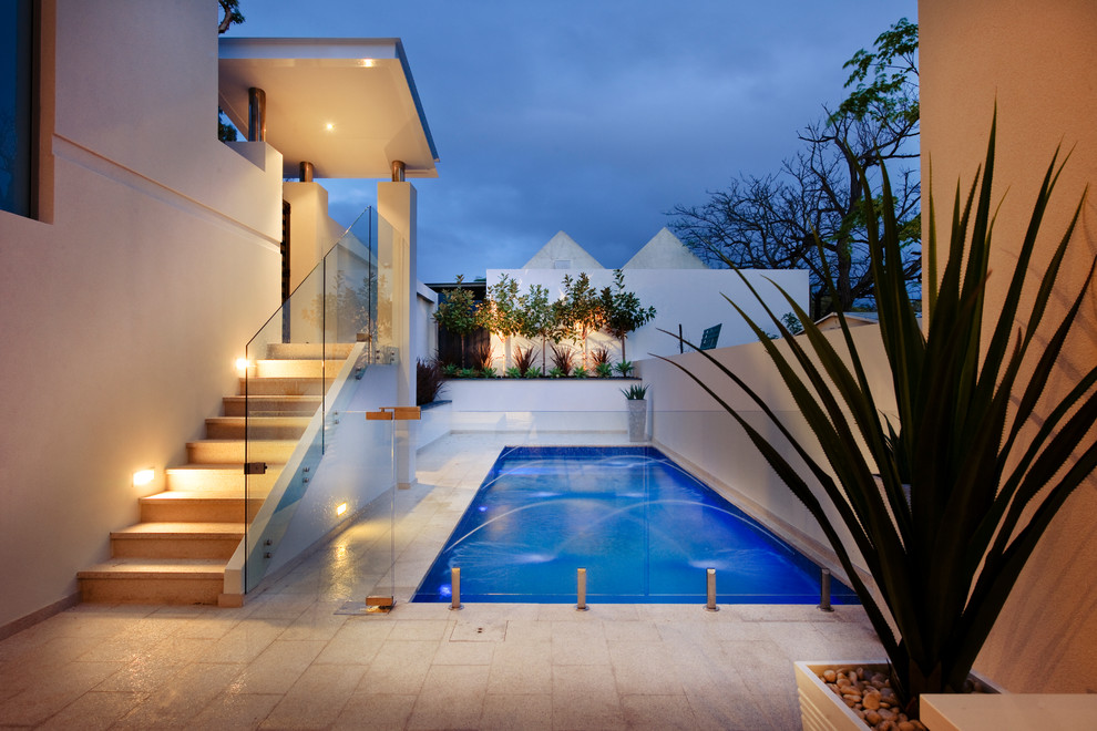 Contemporary rectangular pool in Perth with tile.